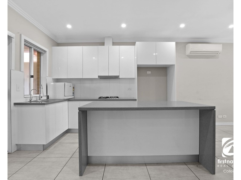 11a Rutherglen Drive, St Andrews NSW 2566