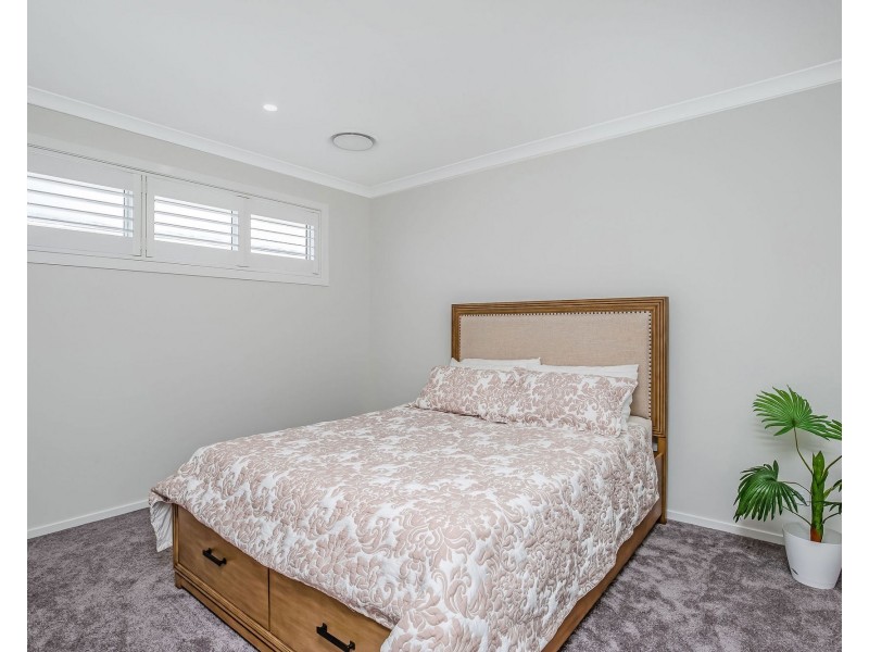 18 Frangipani Court, Jacobs Well QLD 4208