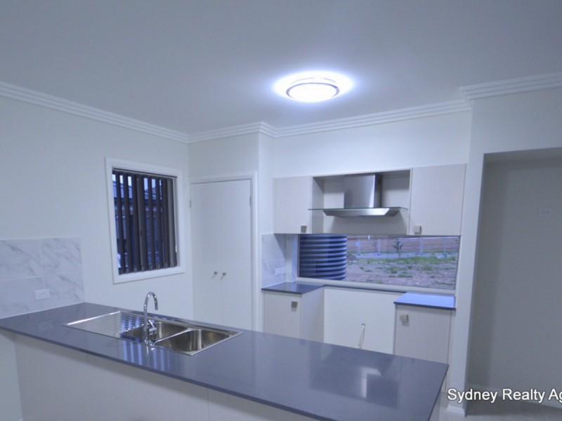 75 Commissioners Drive, Denham Court NSW 2565