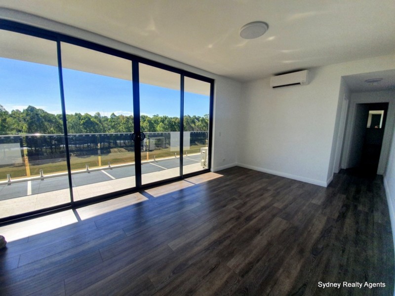 404a/2 Calabria Lane, Prairiewood NSW 2176