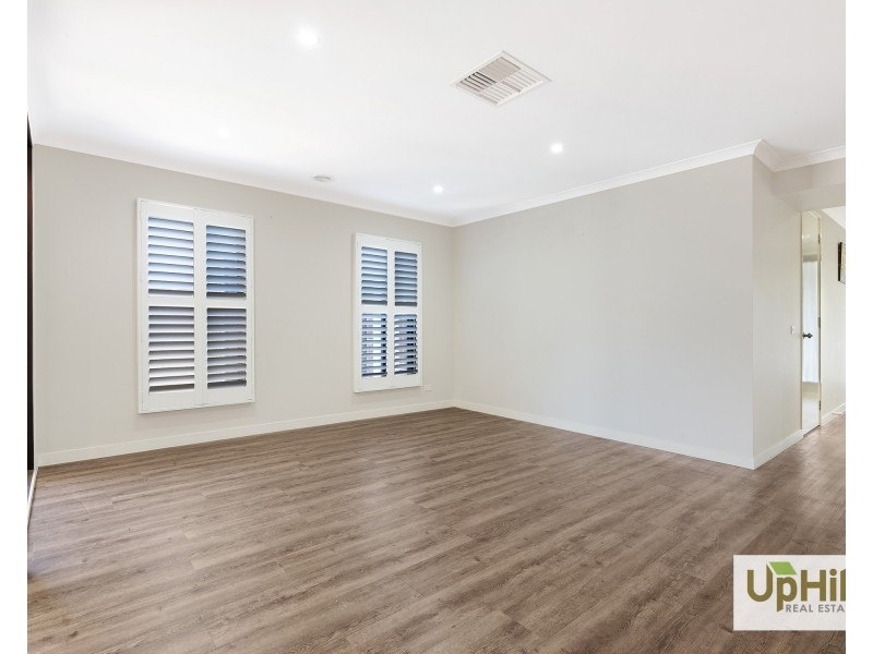 61 Grandstand Crescent, Clyde North VIC 3978