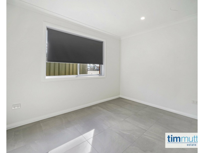 15A Swiveller Cl, Ambarvale NSW 2560