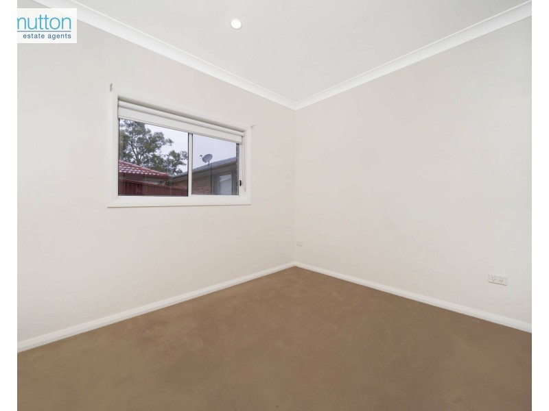 13 Warrina Rd, Bradbury NSW 2560