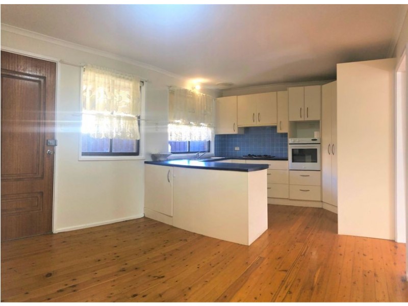 9 Bensley Road, Macquarie Fields NSW 2564