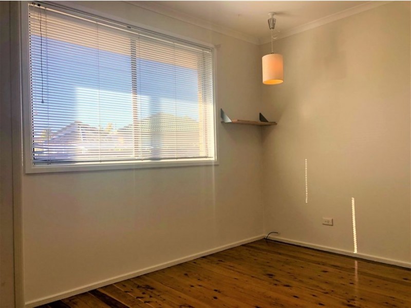 9 Bensley Road, Macquarie Fields NSW 2564