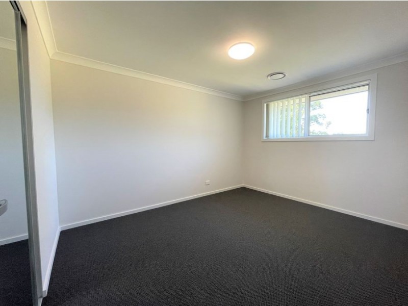 25 Parkland Avenue, Macquarie Fields NSW 2564