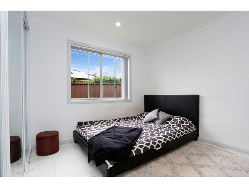 9 Bensley Road, Macquarie Fields NSW 2564