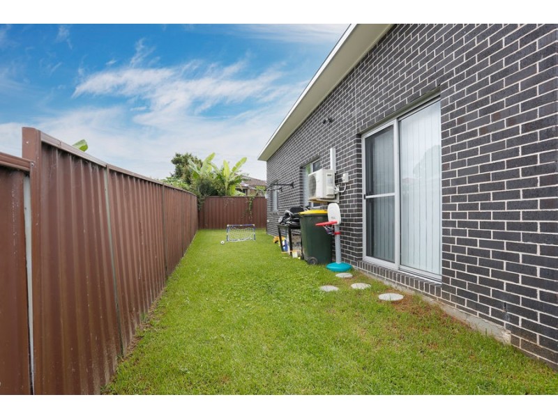 9 Bensley Road, Macquarie Fields NSW 2564
