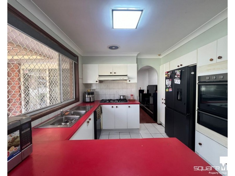 22 Hyacinth Avenue, Macquarie Fields NSW 2564
