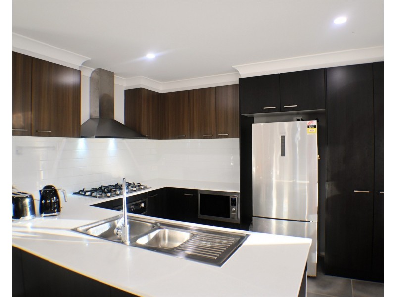 13 Dairyman Place, Calderwood NSW 2527