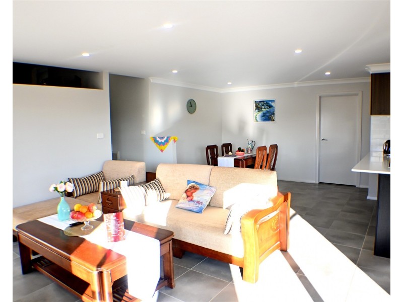 13 Dairyman Place, Calderwood NSW 2527