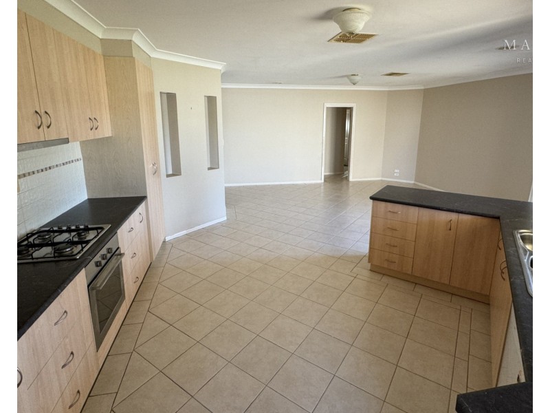 5 Womboin Crescent, Glenfield Park NSW 2650