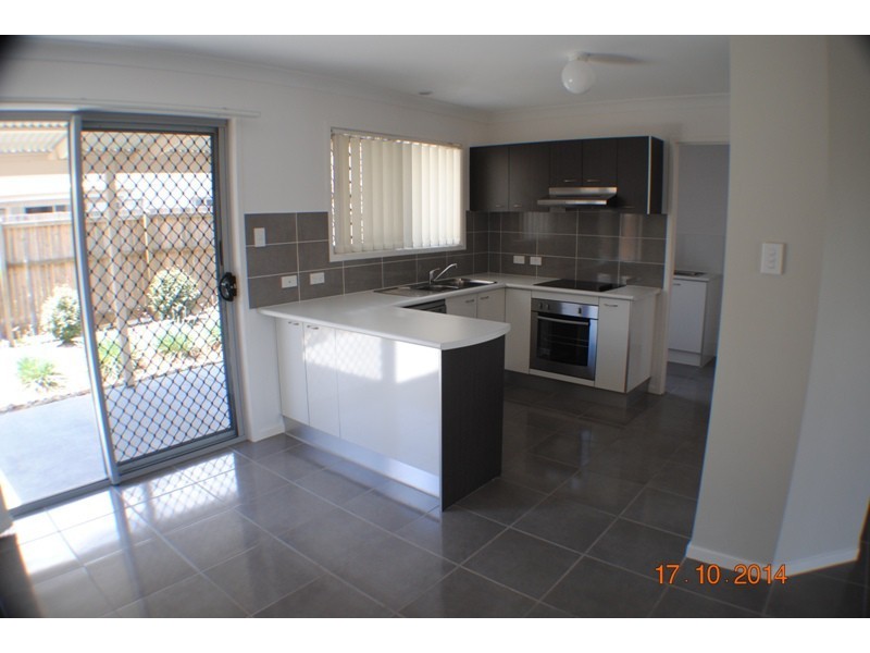 1 McAualey Parade, Pacific Pines QLD 4211