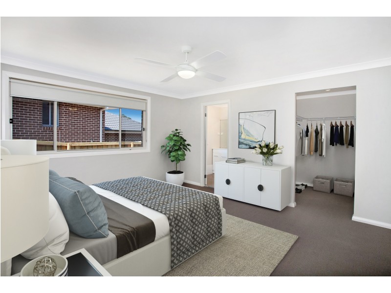 9 Dromedary Pl, Macquarie Links NSW 2565