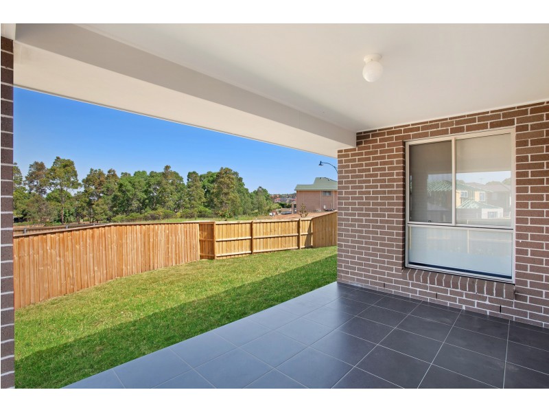 9 Dromedary Pl, Macquarie Links NSW 2565