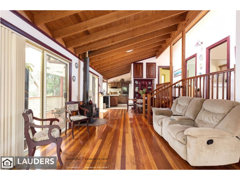 9 Rainforest Drive, Mitchells Island NSW 2430