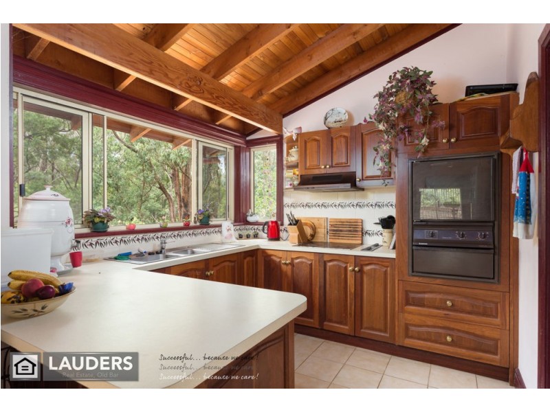 9 Rainforest Drive, Mitchells Island NSW 2430