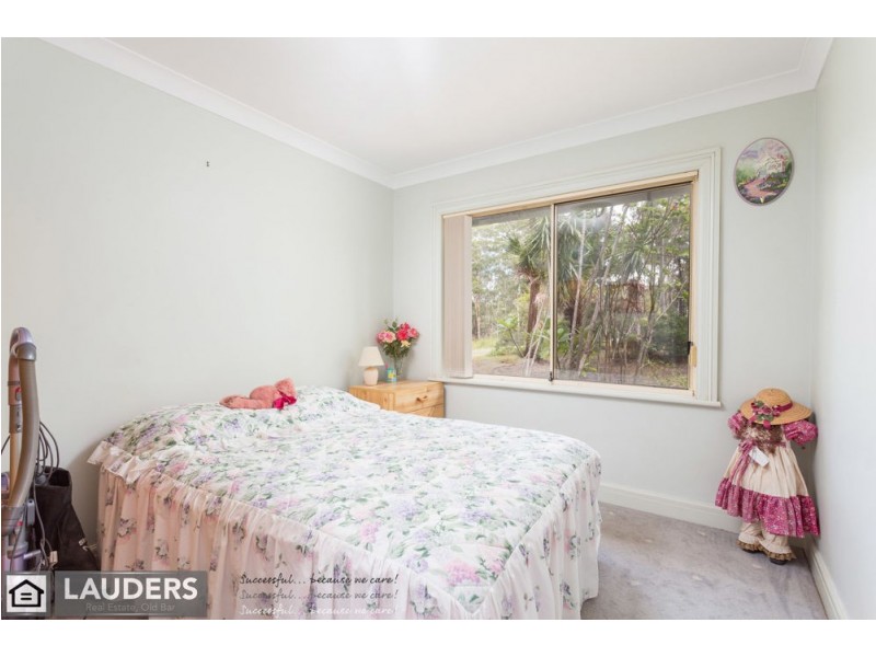 9 Rainforest Drive, Mitchells Island NSW 2430