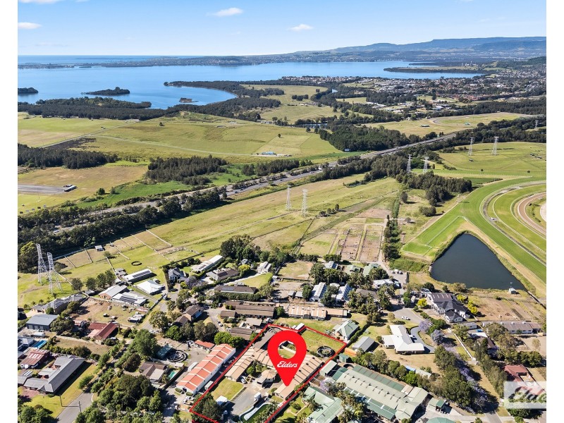 1a Kingston Town Drive, Kembla Grange NSW 2526
