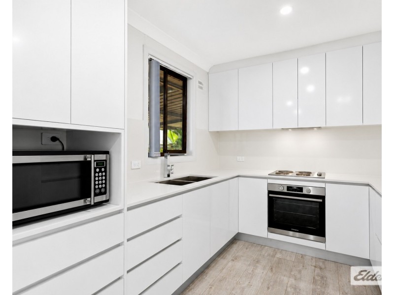 406 Northcliffe Drive, Lake Heights NSW 2502