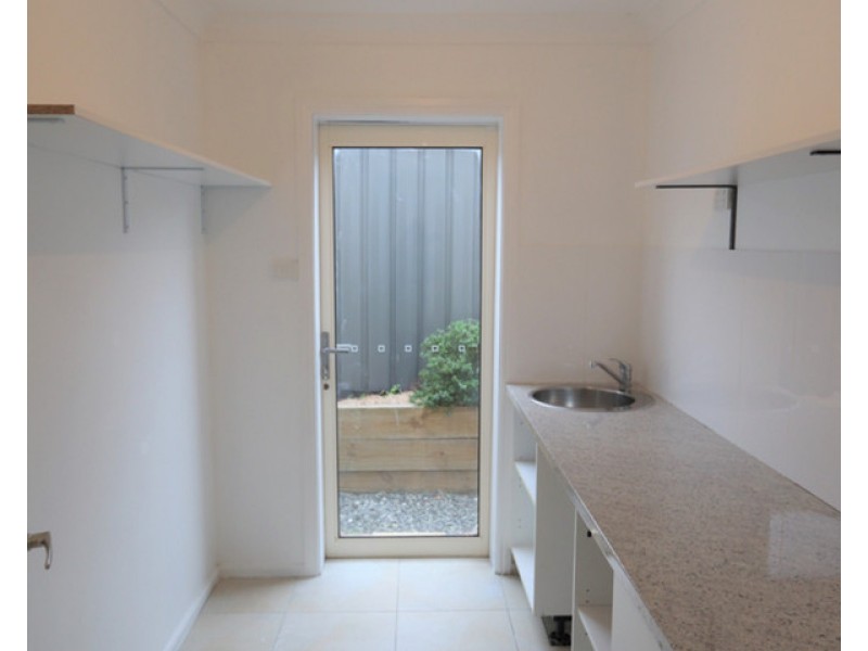 8 Torrens Road, Abermain NSW 2326