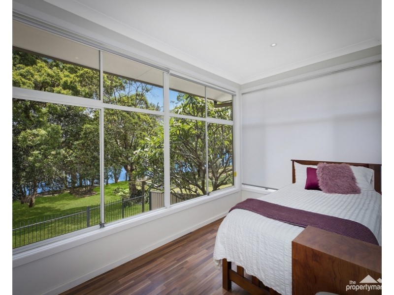 68 Teragalin Drive, Chain Valley Bay NSW 2259