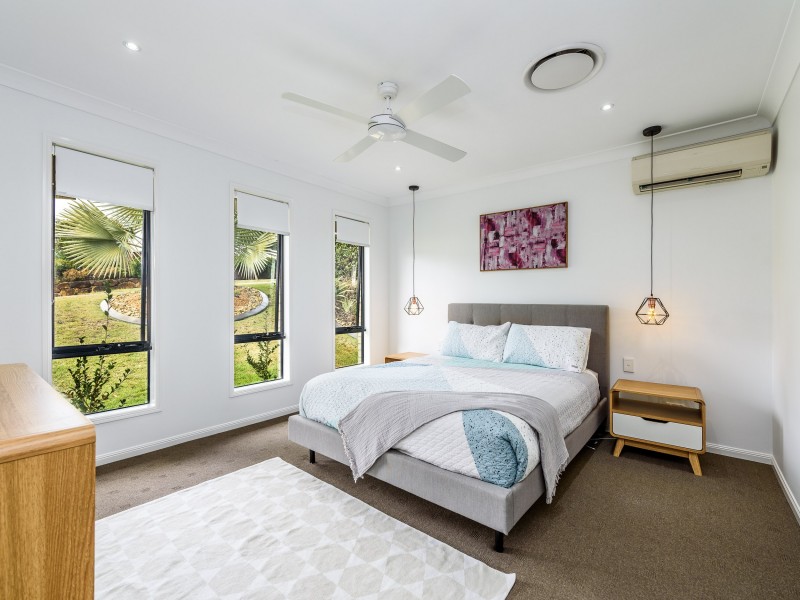 68 Harmsworth Road, Pacific Pines QLD 4211