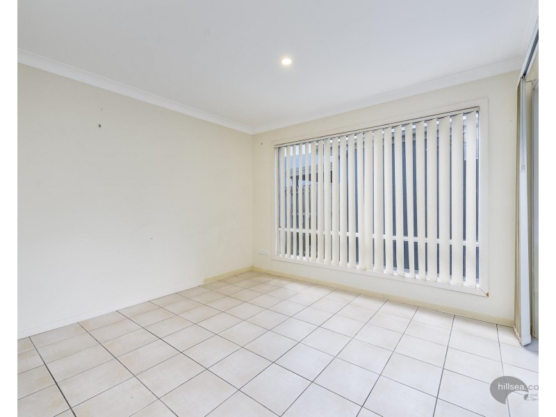 11 Norfolk Drive, Pacific Pines QLD 4211