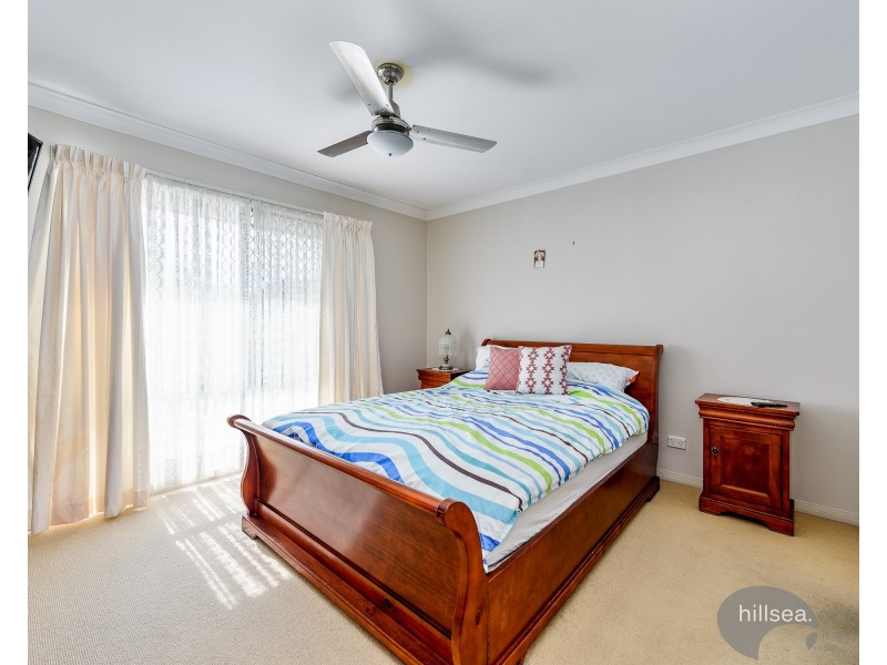 10 Palm Street, Pacific Pines QLD 4211