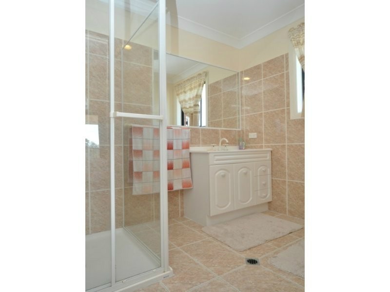 23 Manra Way, Pacific Pines QLD 4211