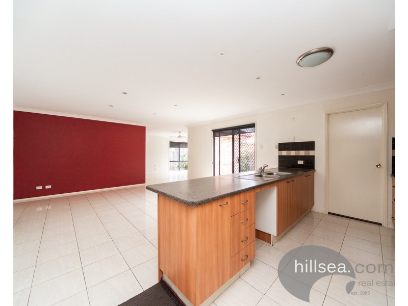 15 Sheffield Circuit, Pacific Pines QLD 4211