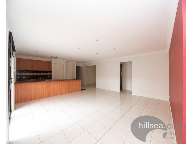 15 Sheffield Circuit, Pacific Pines QLD 4211