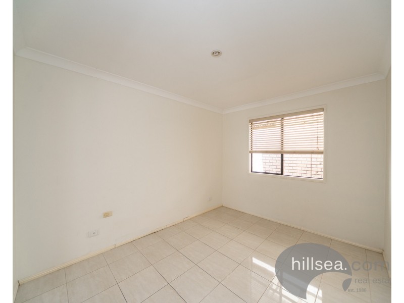 15 Sheffield Circuit, Pacific Pines QLD 4211