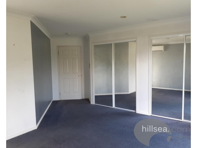 24 Manra Way, Pacific Pines QLD 4211