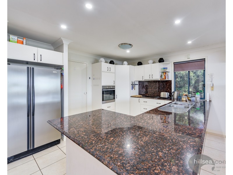 50 Manra Way, Pacific Pines QLD 4211