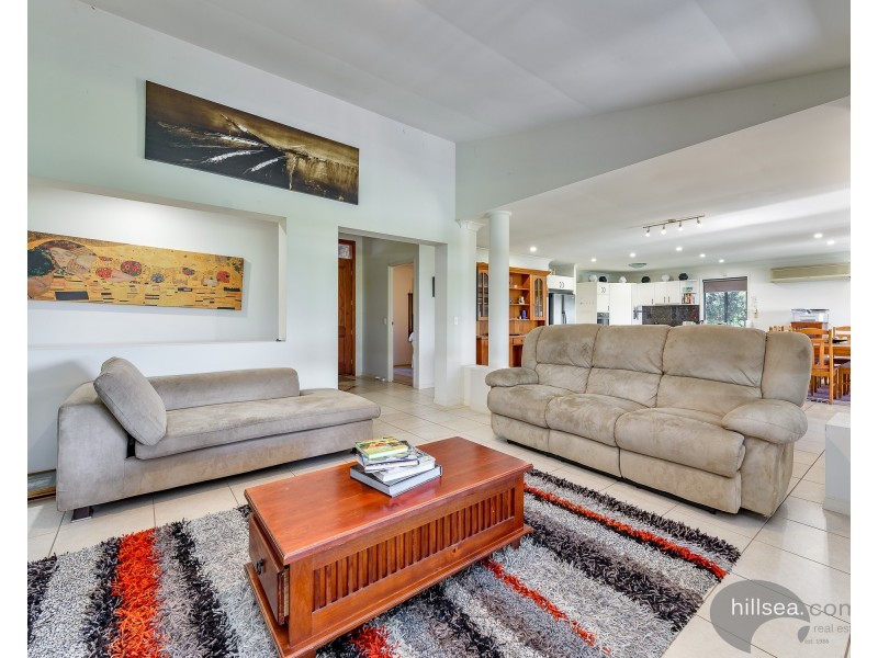 50 Manra Way, Pacific Pines QLD 4211