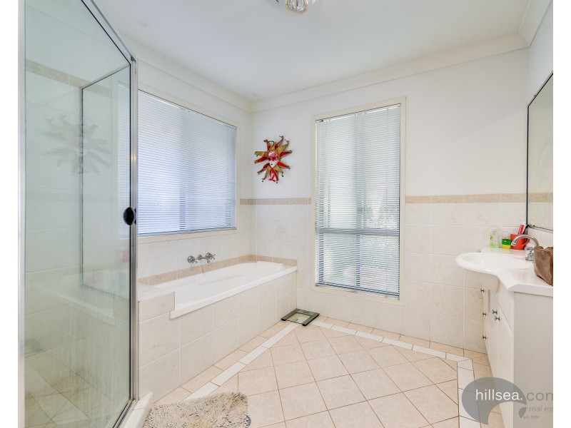 50 Manra Way, Pacific Pines QLD 4211