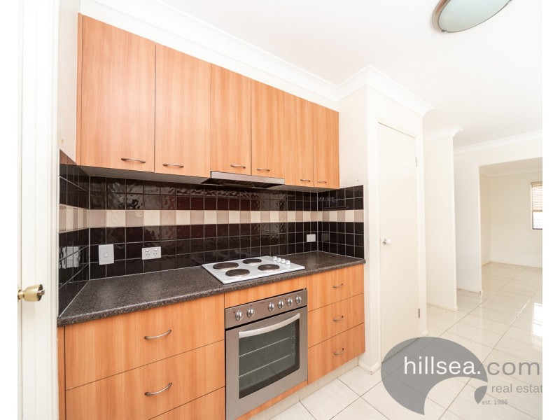 15 Sheffield Circuit, Pacific Pines QLD 4211