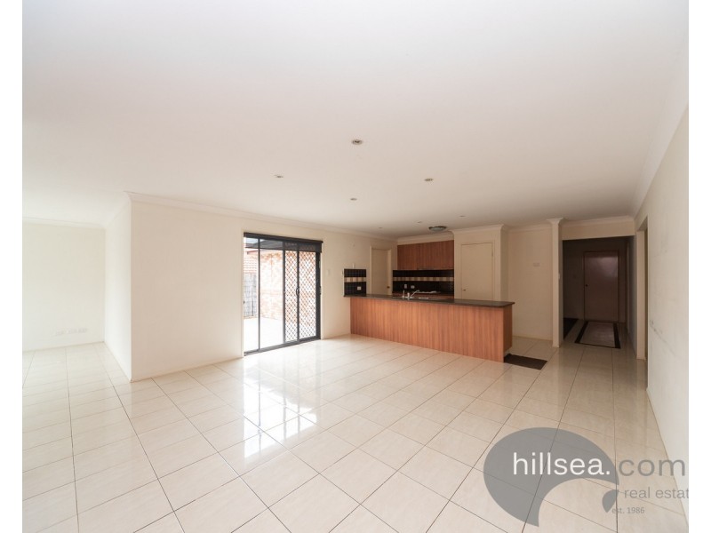 15 Sheffield Circuit, Pacific Pines QLD 4211