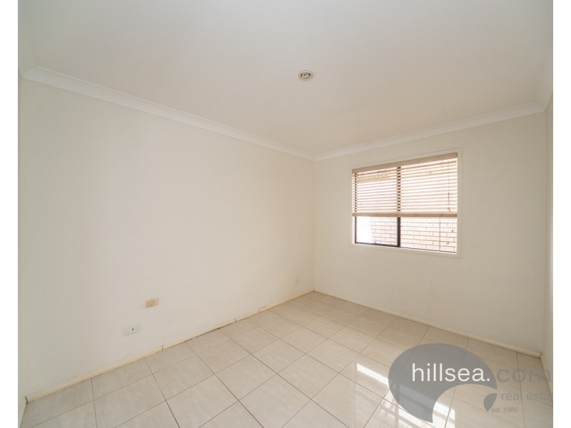 15 Sheffield Circuit, Pacific Pines QLD 4211