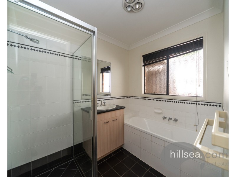 15 Sheffield Circuit, Pacific Pines QLD 4211