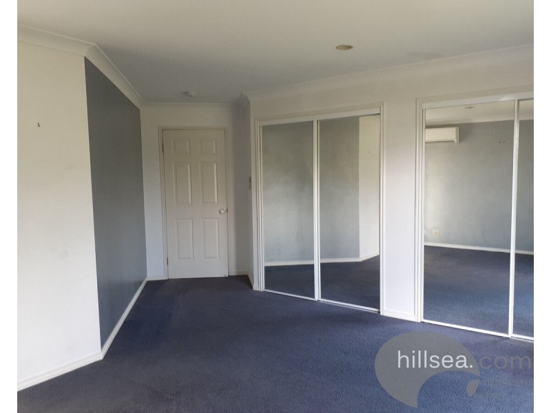 24 Manra Way, Pacific Pines QLD 4211