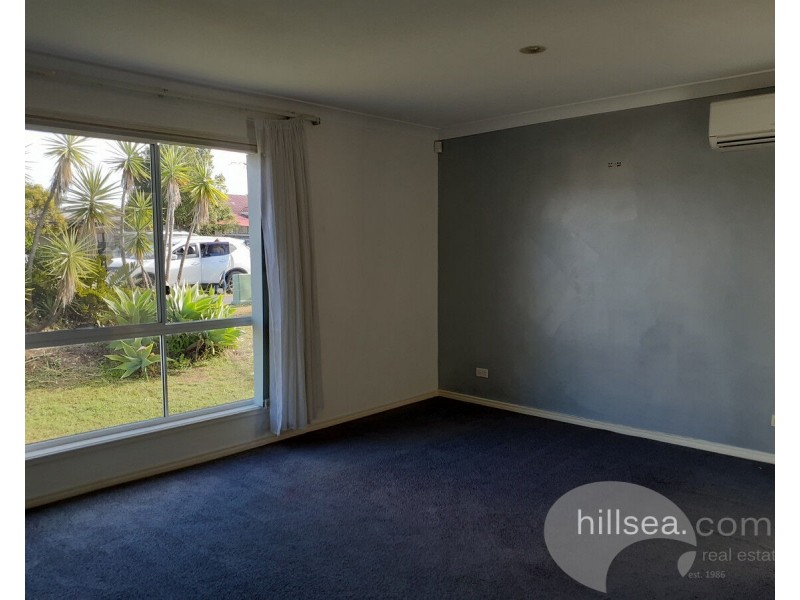 24 Manra Way, Pacific Pines QLD 4211