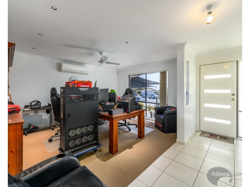74 Wunburra Circle, Pacific Pines QLD 4211