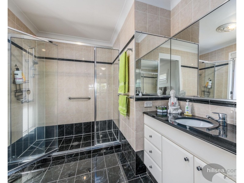 50 Manra Way, Pacific Pines QLD 4211