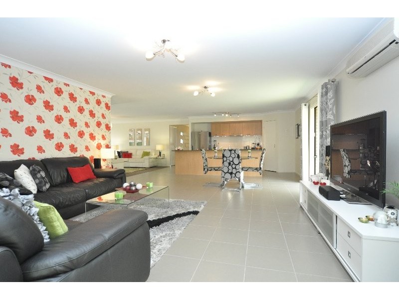 68 Harmsworth Road, Pacific Pines QLD 4211