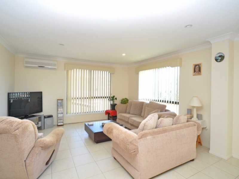 23 Manra Way, Pacific Pines QLD 4211