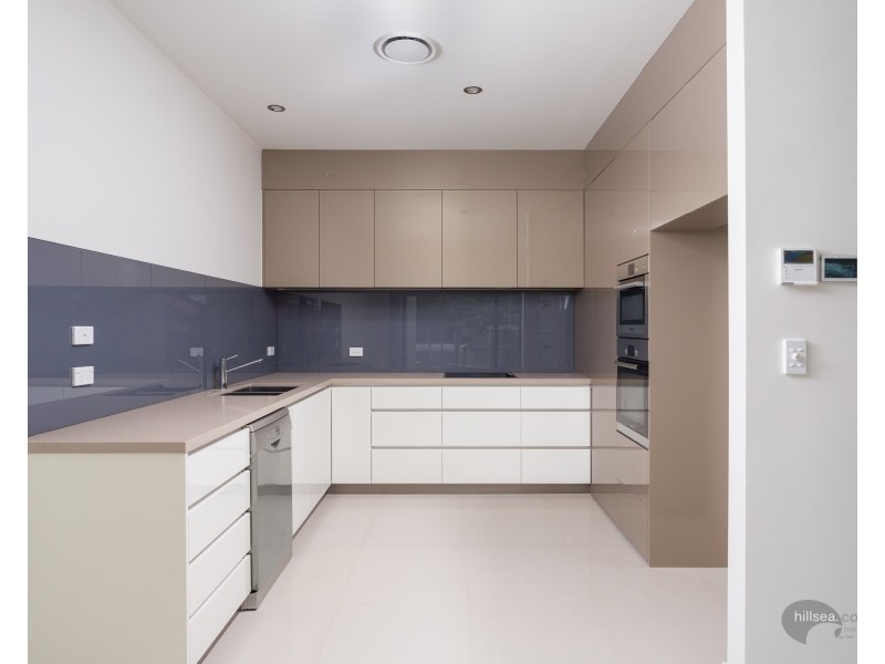 1/2 Bulolo Avenue, Runaway Bay QLD 4216