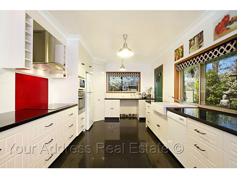 100 Merluna Road, Park Ridge South QLD 4125