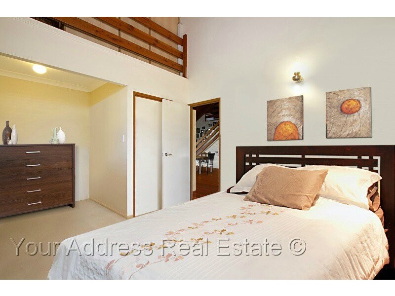 100 Merluna Road, Park Ridge South QLD 4125